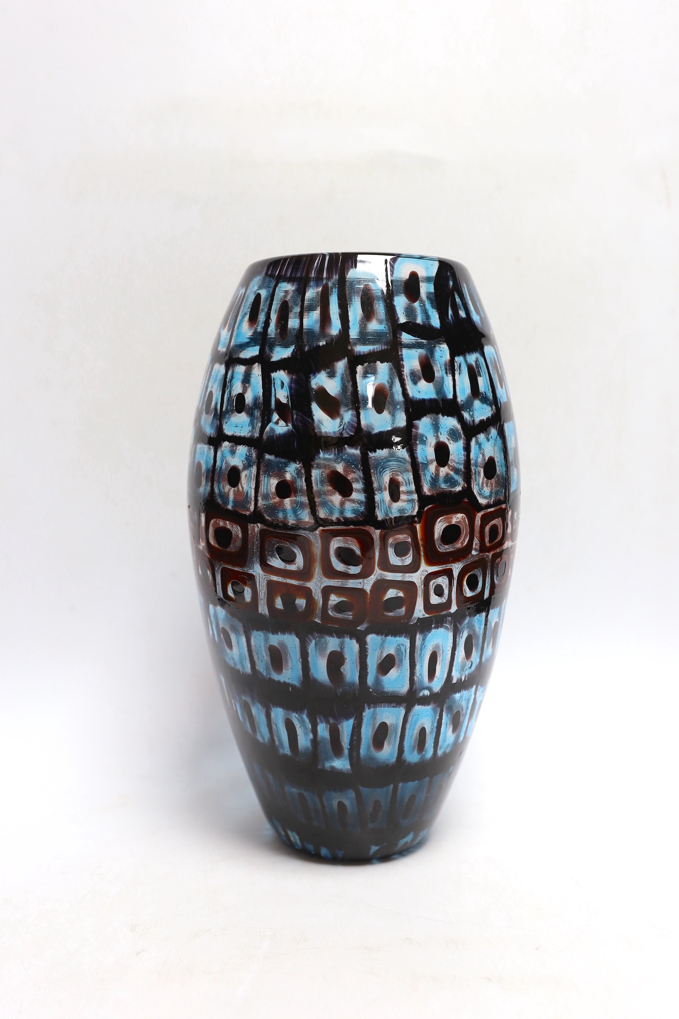 Vittorio Ferro (1932-2012) A Murano glass Murrine vase, ovoid shaped, with bands of squares in blue and red, unsigned, 29cm, Please note this lot attracts an additional import tax of 20% on the hammer price